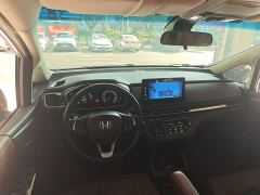 Honda Odyssey 2.0L e:HEV Sharp Radiance Edition - ფოტო 9