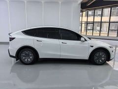 Tesla Model Y L Long Range All-Wheel Drive - ფოტო 12