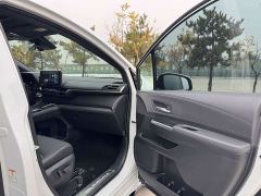 Toyota Sienna 2.5L Hybrid AWD Premium - ფოტო 11
