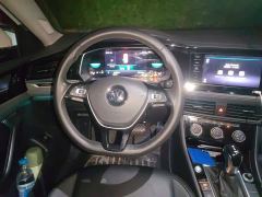 Volkswagen Sagitar 200TSI DSG Comfort Smart Connected Edition - ფოტო 11
