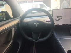 Tesla Model Y Standard Range RWD - ფოტო 11