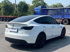 Tesla Model Y Rear-Wheel Drive - ფოტო 4