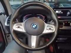 BMW iX3 Facelift Premier - ფოტო 10