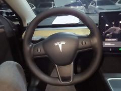 Tesla Model Y Standard Range RWD - ფოტო 10