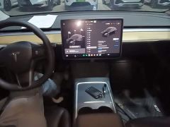 Tesla Model Y Standard Range RWD - ფოტო 9