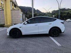 Tesla Model Y Rear-Wheel Drive - ფოტო 4