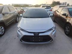 Toyota Corolla Hybrid 1.8H E-CVT Luxury - ფოტო 2
