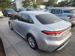 Toyota Corolla Hybrid 1.8H E-CVT Luxury - ფოტო 4