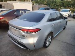 Toyota Corolla Hybrid 1.8H E-CVT Luxury - ფოტო 6