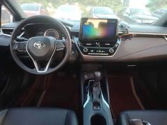 Toyota Corolla Hybrid 1.8H E-CVT Luxury - ფოტო 9