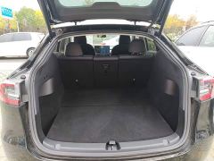 Tesla Model Y Standard Range RWD - ფოტო 18