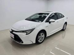Toyota Corolla Hybrid 1.8H E-CVT Luxury - ფოტო 1