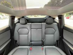 Tesla Model Y Rear-Wheel Drive - ფოტო 12
