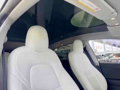 Tesla Model Y Standard Range RWD - ფოტო 4