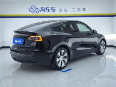 Tesla Model Y Rear-Wheel Drive - ფოტო 3