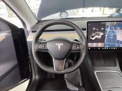 Tesla Model Y Standard Range RWD - ფოტო 10