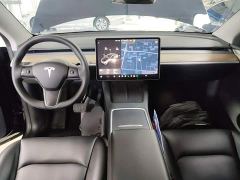 Tesla Model Y Standard Range RWD - ფოტო 9