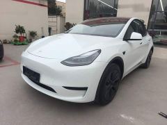 Tesla Model Y Rear-Wheel Drive - ფოტო 1