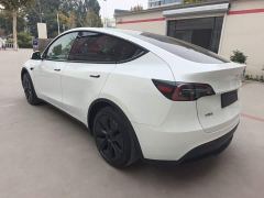 Tesla Model Y Rear-Wheel Drive - ფოტო 4