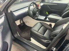 Tesla Model Y Rear-Wheel Drive - ფოტო 2