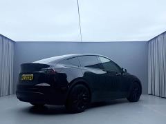 Tesla Model Y Standard Range RWD - ფოტო 3