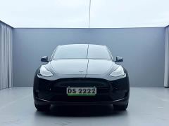 Tesla Model Y Standard Range RWD - ფოტო 4
