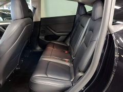 Tesla Model Y Rear-Wheel Drive - ფოტო 16