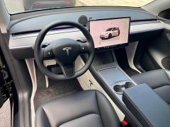 Tesla Model Y Rear-Wheel Drive - ფოტო 9