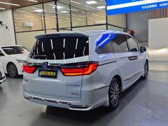 Honda Odyssey 2.0L e:HEV Luxury - фото 11