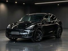 Tesla Model Y Rear-Wheel Drive - ფოტო 1