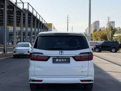 Honda Odyssey 2.0L e:HEV Sharp Comfort Edition - ფოტო 6