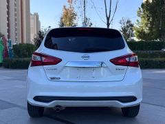 Nissan Qida Tiida 1.6L CVT Smart Edition - ფოტო 8