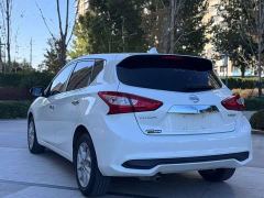 Nissan Qida Tiida 1.6L CVT Smart Edition - ფოტო 9
