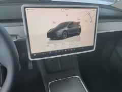 Tesla Model Y Rear-Wheel Drive - ფოტო 12