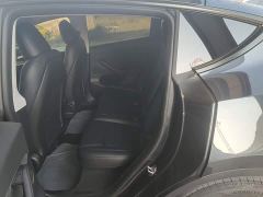 Tesla Model Y Rear-Wheel Drive - ფოტო 16
