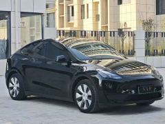 Tesla Model Y Rear-Wheel Drive - ფოტო 1