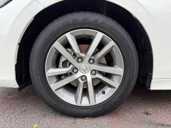 Honda Civic 180TURBO CVT Premium Edition - ფოტო 9