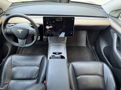 Tesla Model Y Standard Range RWD - ფოტო 9