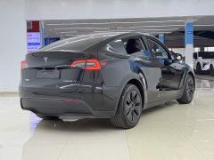 Tesla Model Y Long Range All-Wheel Drive - ფოტო 4