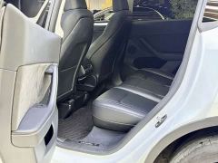 Tesla Model Y Rear-Wheel Drive - ფოტო 16