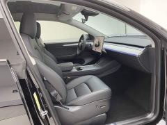 Tesla Model Y Rear-Wheel Drive - ფოტო 18