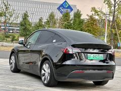 Tesla Model Y Rear-Wheel Drive - ფოტო 4