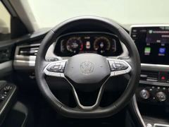 Volkswagen Bora 200TSI DSG Smart Travel PRO - ფოტო 9