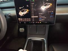 Tesla Model Y Standard Range RWD - ფოტო 12