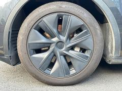 Tesla Model Y Rear-Wheel Drive - ფოტო 20