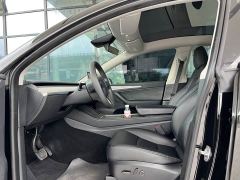 Tesla Model Y Rear-Wheel Drive - ფოტო 4