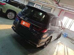 Honda Odyssey 2.0L e:HEV Sharp Premium Edition - ფოტო 7