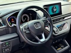 Honda Odyssey 2.0L e:HEV Luxury - ფოტო 4