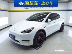 Tesla Model Y Rear-Wheel Drive - ფოტო 1