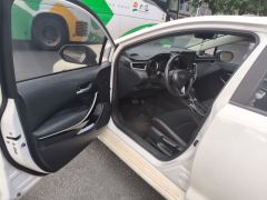 Toyota Corolla Dual-Engine 1.8L E-CVT Pioneer Edition - ფოტო 17